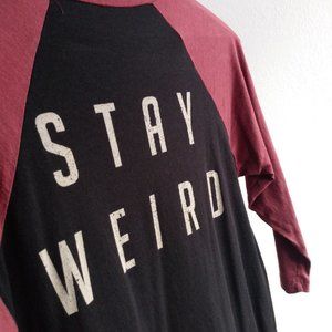 dolls kill "stay weird" baseball tee